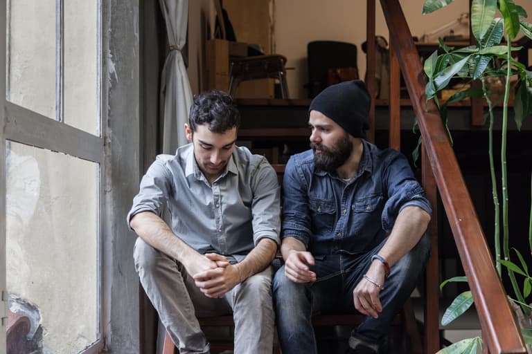3 simple ways to help the men in your life open up, according to an Irish therapist
